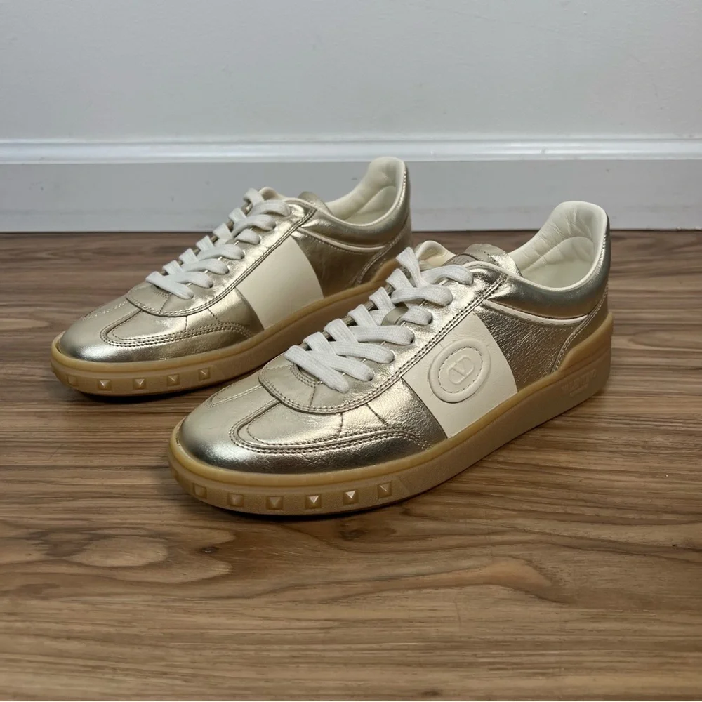 Valentino Garavani Women’s Upvillage Trainer Sneakers in Laminated Calfskin Gold